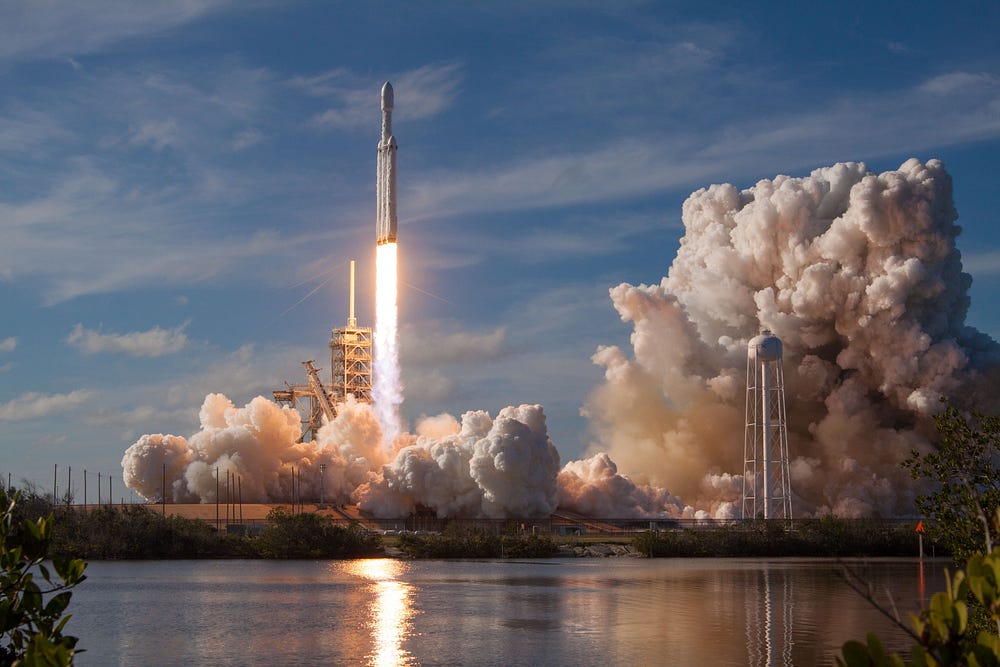 SpaceX rocket launch representing automated deployments